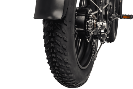 Detailed rear fat tire tread on Movin electric bike designed for all-terrain performance
